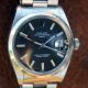 1975 Rolex Oyster Perpetual Date Chronometer Reference 1500 with Rare “Wide Boy” Black Dial on Original Rolex Oyster Bracelet