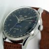 1940's Triple Date Calendar Moonphase Automatic with Black Dial and Red-Tipped Date Hand Pointer Comes in Original Box with Original Shop Hang Tags Lovely Watch and Collector's Piece