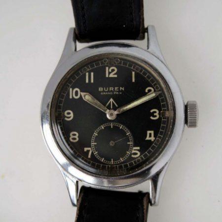 1943 Grand Prix WWW British Military Officers Watch one of the Dirty Dozen With Military Issue Markings on Case-Back and Braodarrow on Original Dial. Original Fixed Bar Military Lugs and Crown