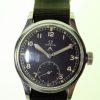 1944 WW2 British Army Officer's Wristwatch with Original Broadarrow Dial and WWW Military Issue Markings on Case-Back. Excellent Original Example with Recent Service Papers