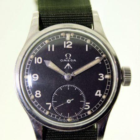 1944 WW2 British Army Officer's Wristwatch with Original Broadarrow Dial and WWW Military Issue Markings on Case-Back. Excellent Original Example with Recent Service Papers