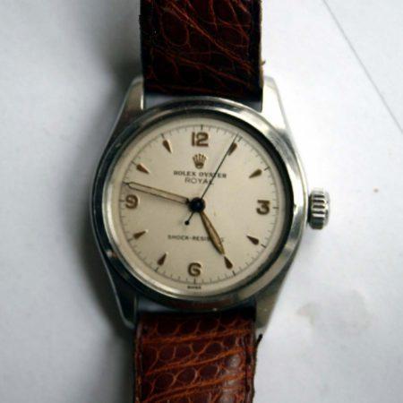1952 Oyster Royal Shock Resisting Swiss Made Dress Watch with Explorer Dial with Gorgeous Applied Gold Hour Markers and Orignal blued Steel Central Seconds Hand