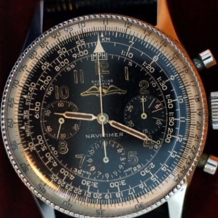 1956 Very Rare Early All Black and Gilt Dial Navitimer Chronograph with All Steel Early Beaded Bezel Case One of the First Made with Box and Original Breitling Sale Papers Dated