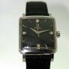 1957 Automatic All Steel Square Case with Horn Lugs and Omega Signed Crown Swiss Made Original Omega Factory Finish Black Dial with Silver Hour Markers 20 Jewel Cal 471 Automatic Movement