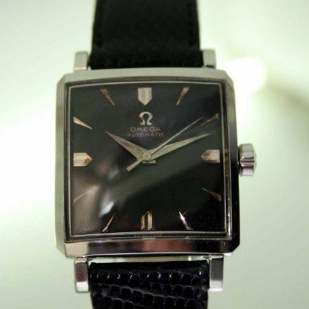 1957 Automatic All Steel Square Case with Horn Lugs and Omega Signed Crown Swiss Made Original Omega Factory Finish Black Dial with Silver Hour Markers 20 Jewel Cal 471 Automatic Movement
