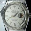 1957 Rare Early Stainless Steel Datejust. Alternating Red and Black "Rolulette" Date. Dauphine Hands. Semi-Bubbleback Case Ref. 6605. All Original Stunning Big Collectible Rolex in Rare Mint Condition.