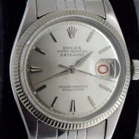 1957 Rare Early Stainless Steel Datejust. Alternating Red and Black "Rolulette" Date. Dauphine Hands. Semi-Bubbleback Case Ref. 6605. All Original Stunning Big Collectible Rolex in Rare Mint Condition.