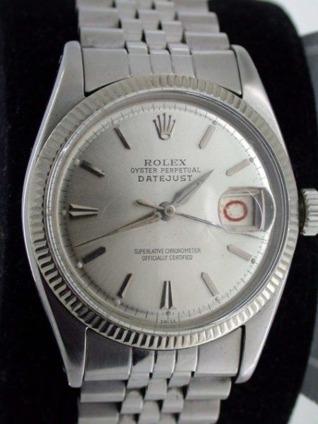 1957 Rare Early Stainless Steel Datejust. Alternating Red and Black "Rolulette" Date. Dauphine Hands. Semi-Bubbleback Case Ref. 6605. All Original Stunning Big Collectible Rolex in Rare Mint Condition.