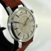 1959 Memovox Alarm Bumper Automatic Wristwatch with Calendar in All Stainless Steel Case with JLC Logo Signed Crowns. One Owner From New and Superb Condition European Model Jaeger Memovox
