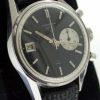 1960's Carrera 45 Dato Ref. 3147N. Mint Original Superb Black Dial with Contrasting One White Sub-Dial and Date Window at 9. First Chronograph with a Date Function. Comes with Heuer Buckle