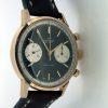 1960's Top Time Geneve Chronograph. Collectible Two Register Black Dial Top Time with White Outer Tachymeter Rim. Mint Condition. Original Breitling Signed Winding Crown and Breitling Strap.