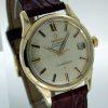 1961 18K Solid Yellow Gold Automatic Chronometer Constellation with Solid Gold and Onyx Hour Markers and Hands. Comes on Omega Strap and Buckle