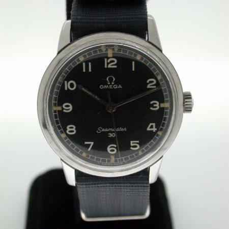 1964 Seamaster 30 Military Watch with Original Black Dial and with Military Markings A/2243 in all Steel Omega "Seamonster" Case Ref. 135.007-64. Caliber 286 Manual Winding