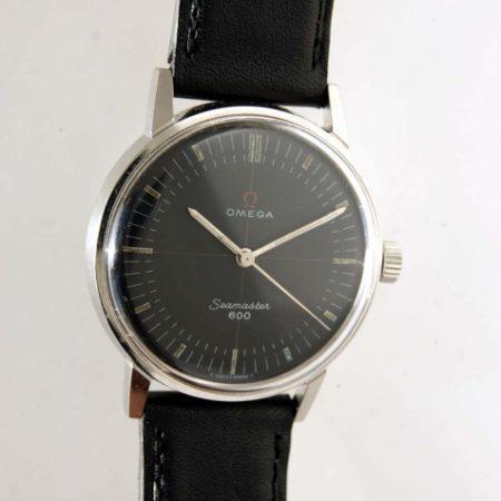 1964 Seamaster 600 with Rare Factory Original Black Dial with Red Cross-Hairs. Omega Seamonster Logo on Case-Back. Original Omega Signed Crown