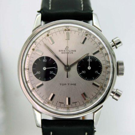 1969 Geneve Top Time Chronograph with Original Silver Sunburst Finish Dial with Two Black Sub-Dials. Stainless Steel Chromed Case. Mint Perfect Condition on Breitling Buckle