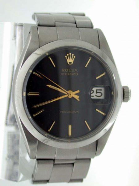 1969 Oysterdate Ref. 6694 with Gloss Black and Gilt Original Rolex Dial. Rolex Signed Oyster Screw Down Crown. Original 1960's Mint Condition Rolex Steel Bracelet