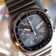 Automatic Speedmaster Chronograph Cal. 1045. Calendar in English. Superb Condition and with its Original Papers