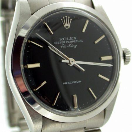 Beautiful 1986 Oyster Perpetual Air King Precision Black Dial with Silver Baton Hour Markers. All Original Mint Condition Throughout. Original Oyster Bracelet and Rolex Box