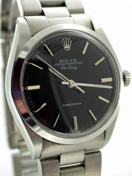 Beautiful 1986 Oyster Perpetual Air King Precision Black Dial with Silver Baton Hour Markers. All Original Mint Condition Throughout. Original Oyster Bracelet and Rolex Box