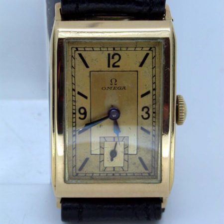 Rare 1930's Solid 18k Yellow Gold Art Deco Gentleman's Wristwatch with High Quality Omega Cal. 20F Movement. Original Two-tone Dial. Stunning Curved-Back Gold Case!