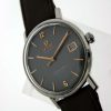 Vintage 1960s New Old Stock "NOS" Automatic Seamaster Calendar De Ville with Original Grey Dial with Bronze Hour Markers. Never Been Used on NOS Matching Omega Strap and Vintage Buckle