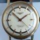 c1950 18k Gold Capped Steel Conquest Automatic in Near NOS Condition with Original Stepped Dial and Beautiful Fish Logo Case-Back and NOS Longines Strap and Buckle